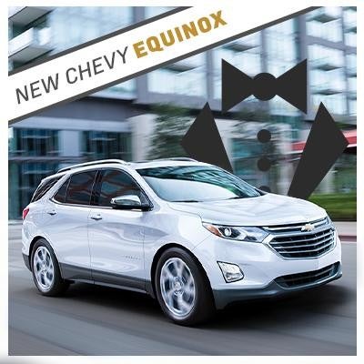 New White Chevy Equinox with tuxedo graphic background