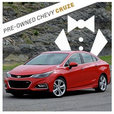 Pre-owned red Chevy Cruze with tuxedo graphic background